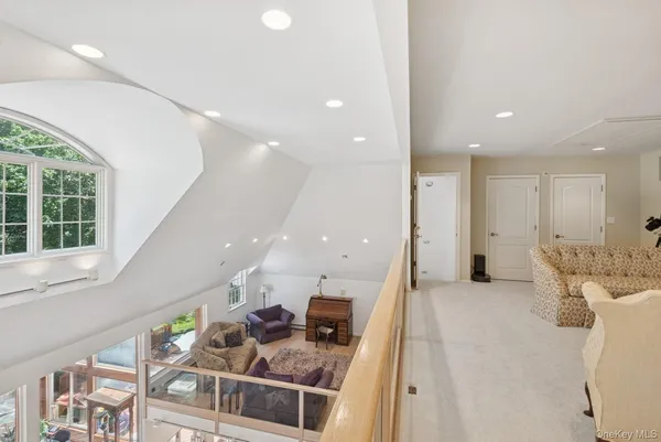 a living room with a couch and a large window