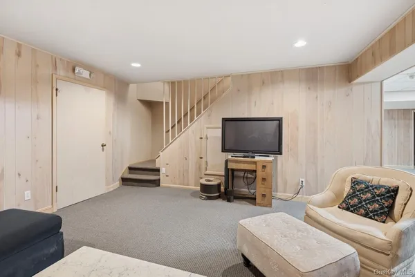 a black and white photo of a living room