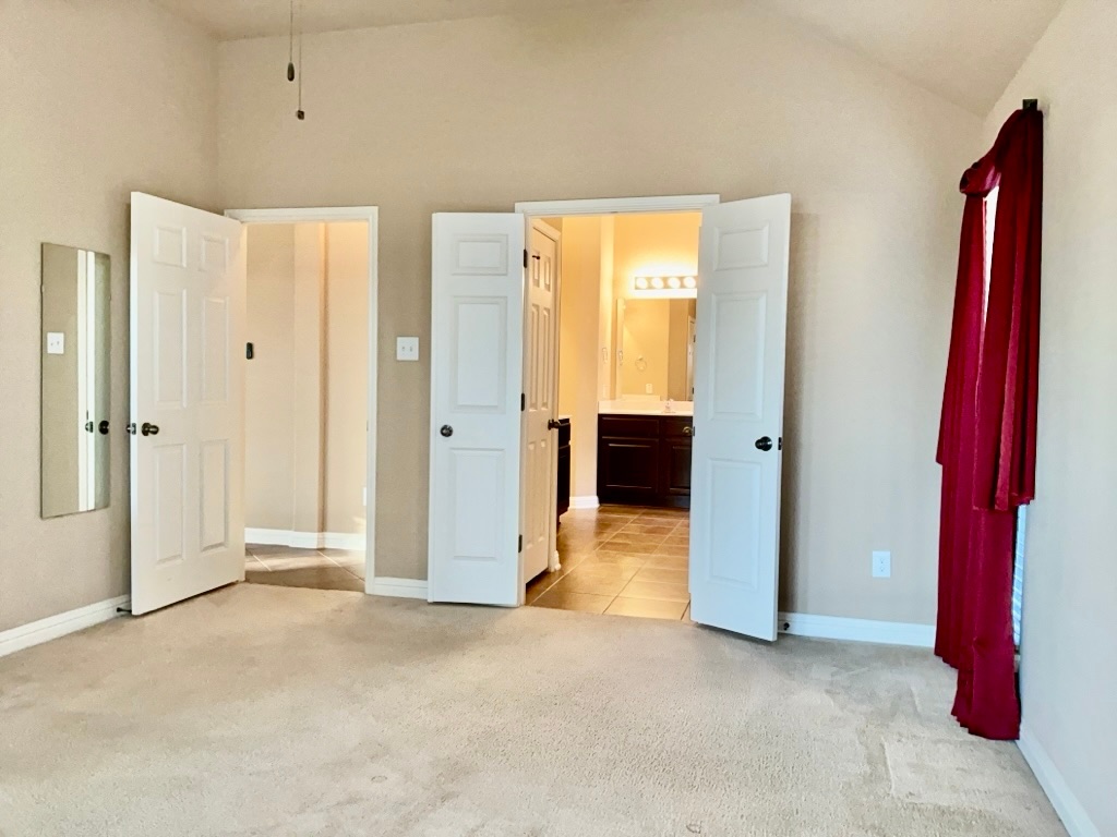 3580 Rosalina Loop Round Rock, TX 78665 - Photo 18 of 27 an empty room with windows cabinet and mirror