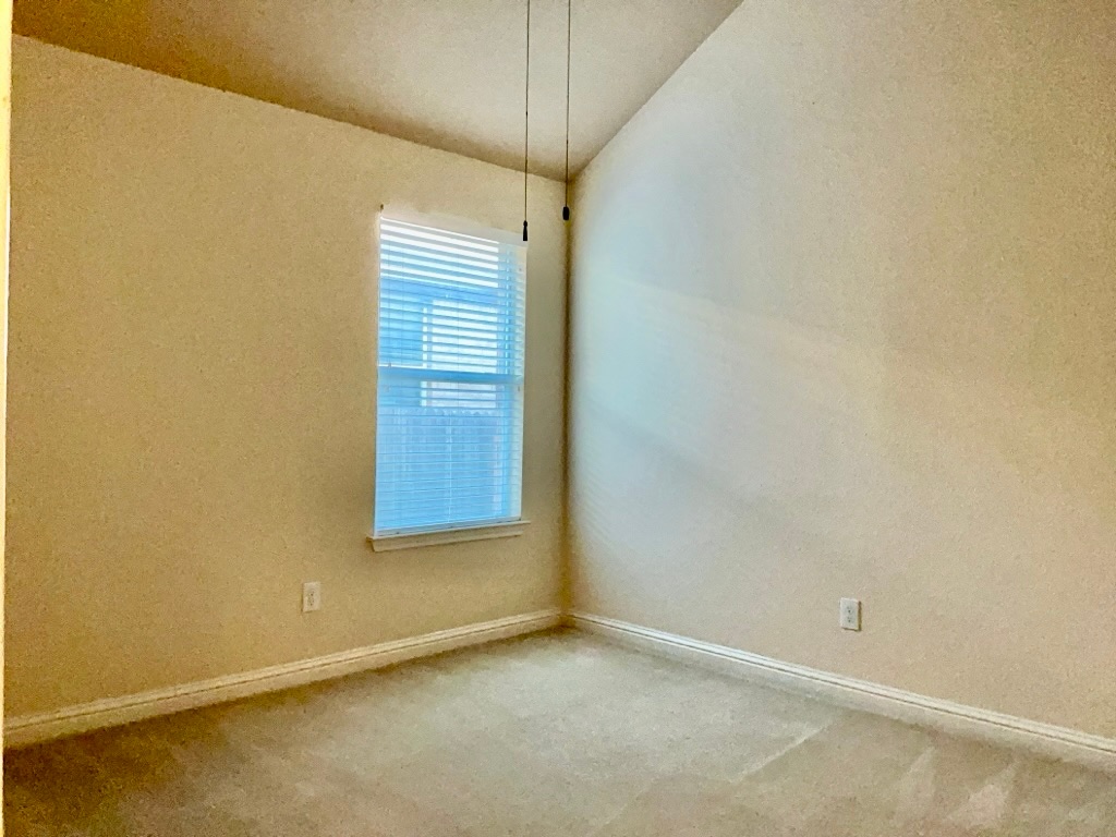 3580 Rosalina Loop Round Rock, TX 78665 - Photo 21 of 27 a view of an empty room with a window