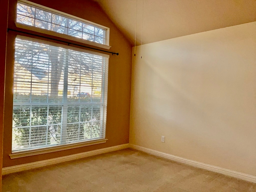 3580 Rosalina Loop Round Rock, TX 78665 - Photo 24 of 27 a view of an empty room with a window