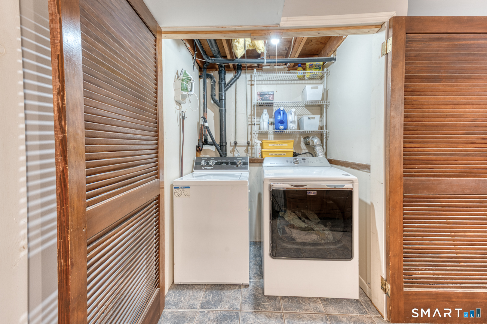 23 Thompson Hill Road Columbia, CT 06237 - Photo 28 of 39 Laundry in lower level in full bath