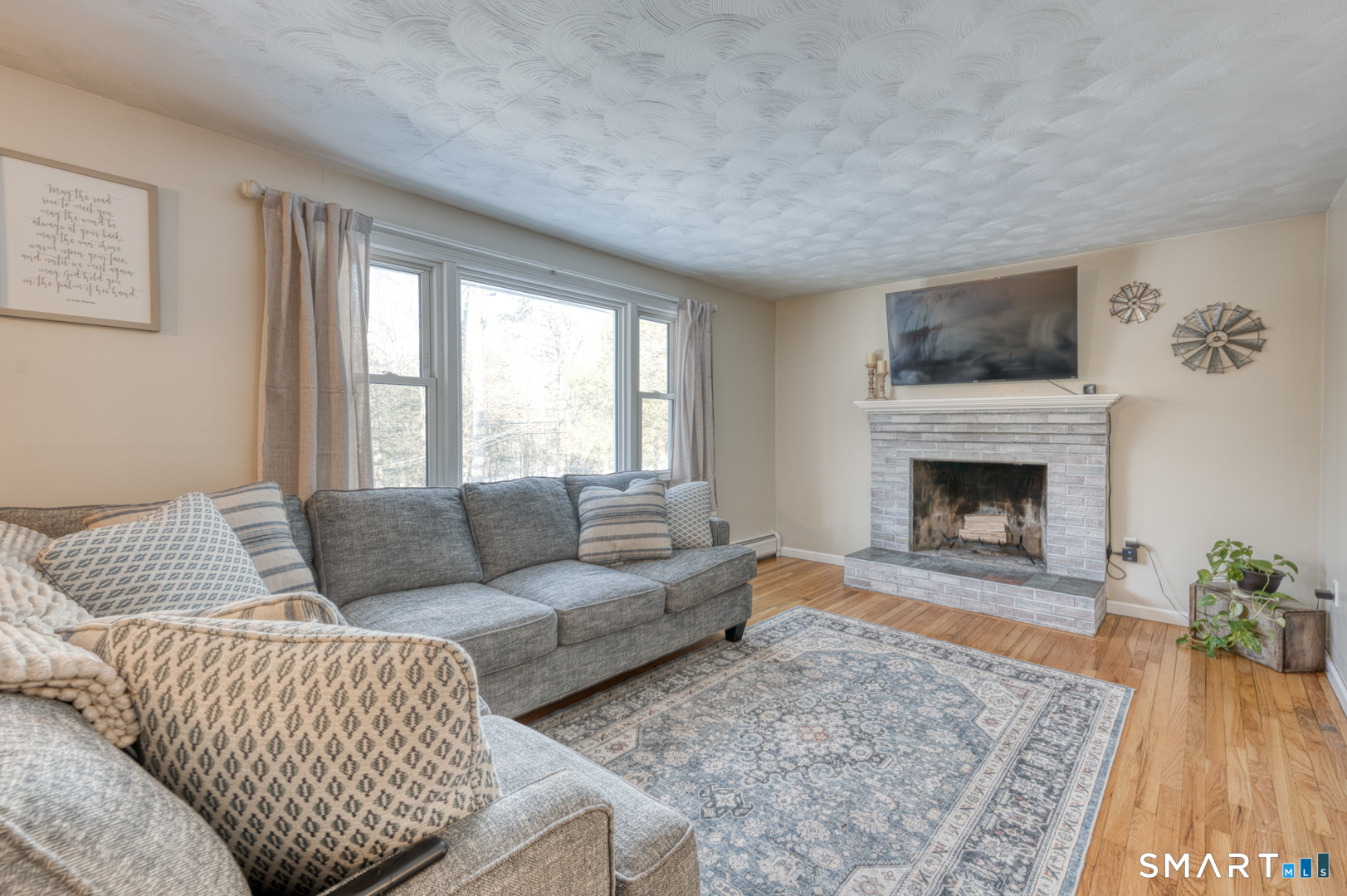 23 Thompson Hill Road Columbia, CT 06237 - Photo 9 of 39 Room offers lots of natural light opens into kitchen