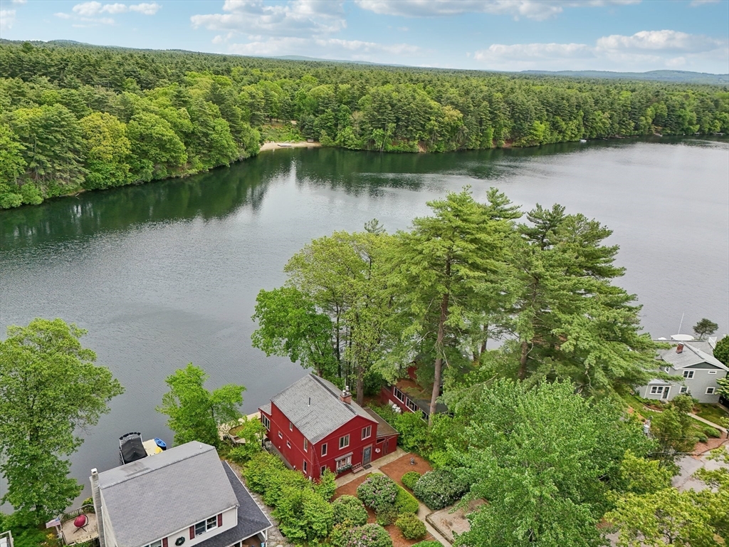 56 Pine Point Road Stow, MA 01775 - Photo 27 of 34 an aerial view of a house with a yard and lake view