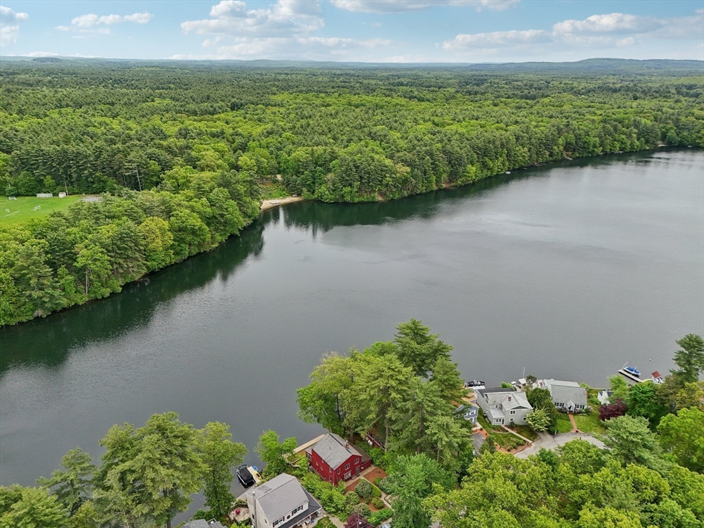 56 Pine Point Road Stow, MA 01775 - Photo 28 of 34 a view of a lake with a city