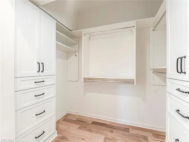 a view of an empty walk in closet