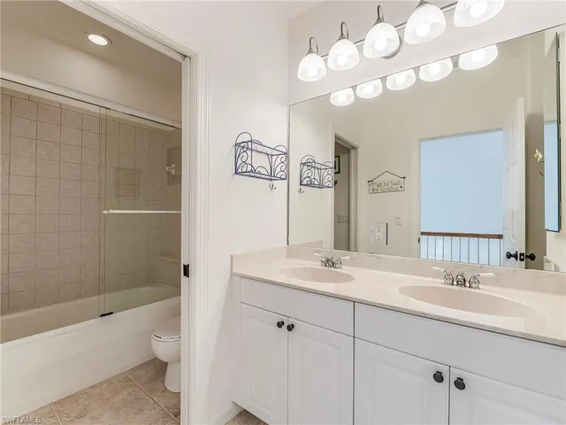a view of storage and utility room with washer and dryer