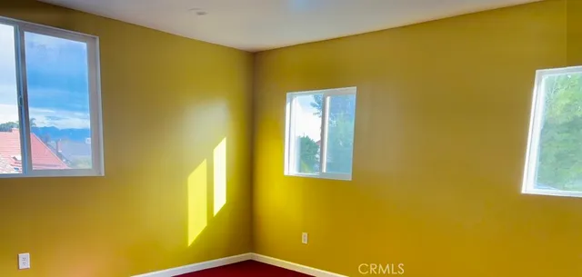 a bathroom with a toilet and shower