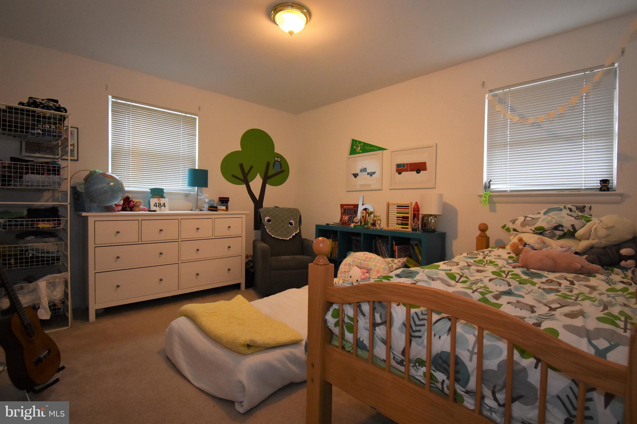6405 Middleburg Lane Bethesda, MD 20817 - Photo 15 of 21 a bedroom with two beds and a dresser