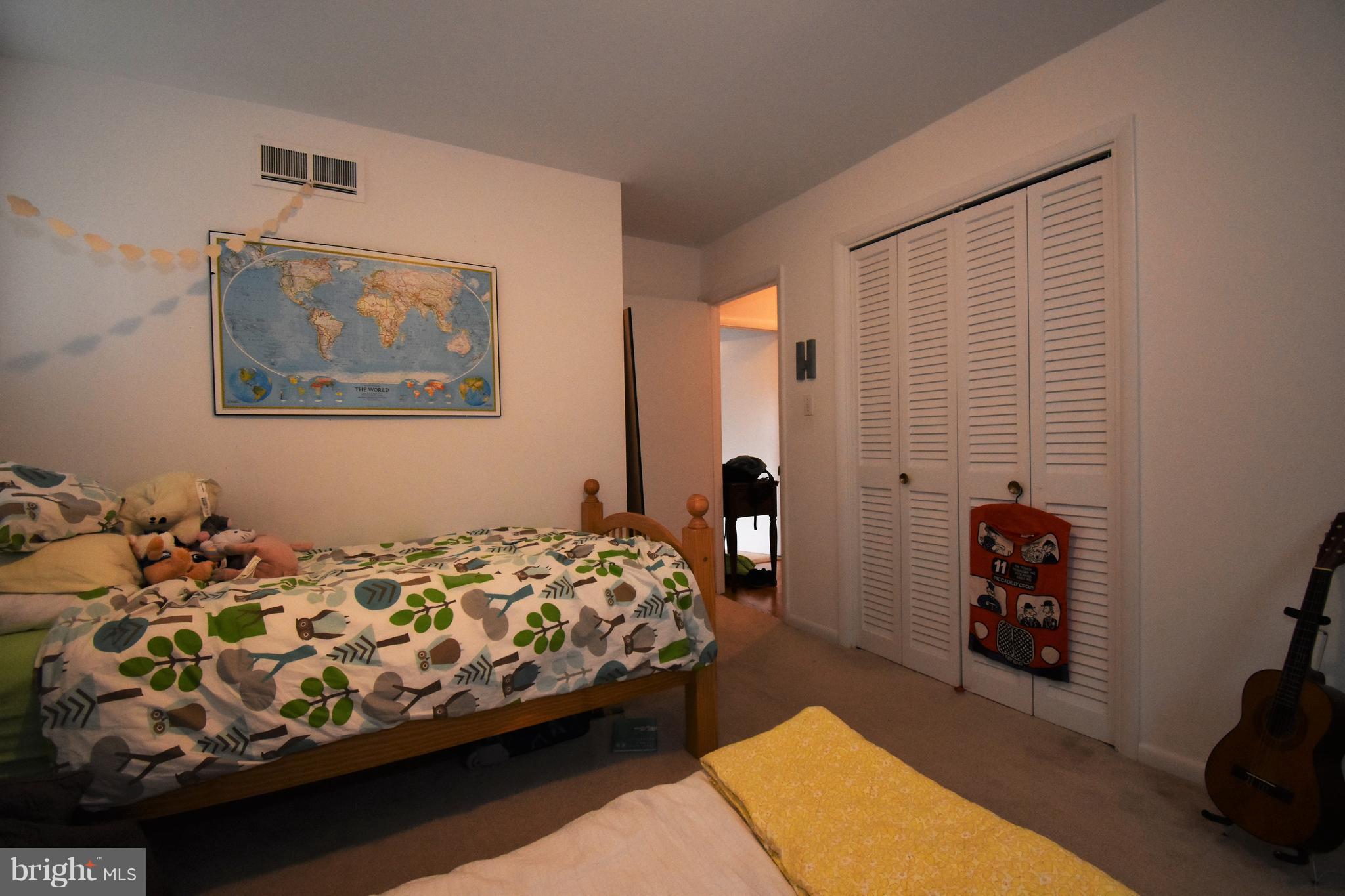 6405 Middleburg Lane Bethesda, MD 20817 - Photo 16 of 21 a bedroom with bed and a window
