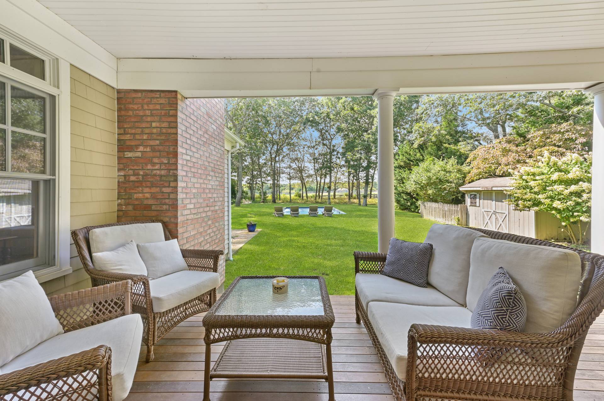 Undisclosed Address Water Mill, NY 11976 - Photo 14 of 28 a living room with furniture and a yard