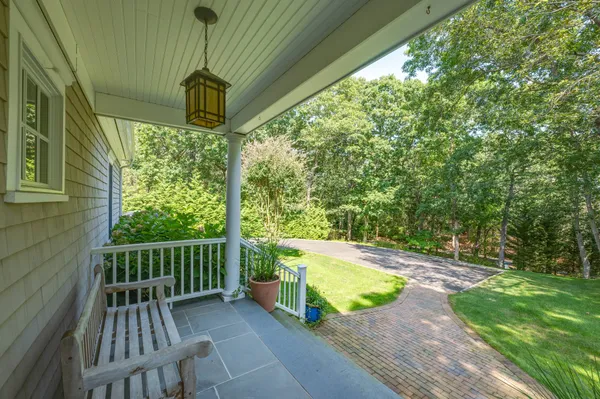 a view of a porch with a yard