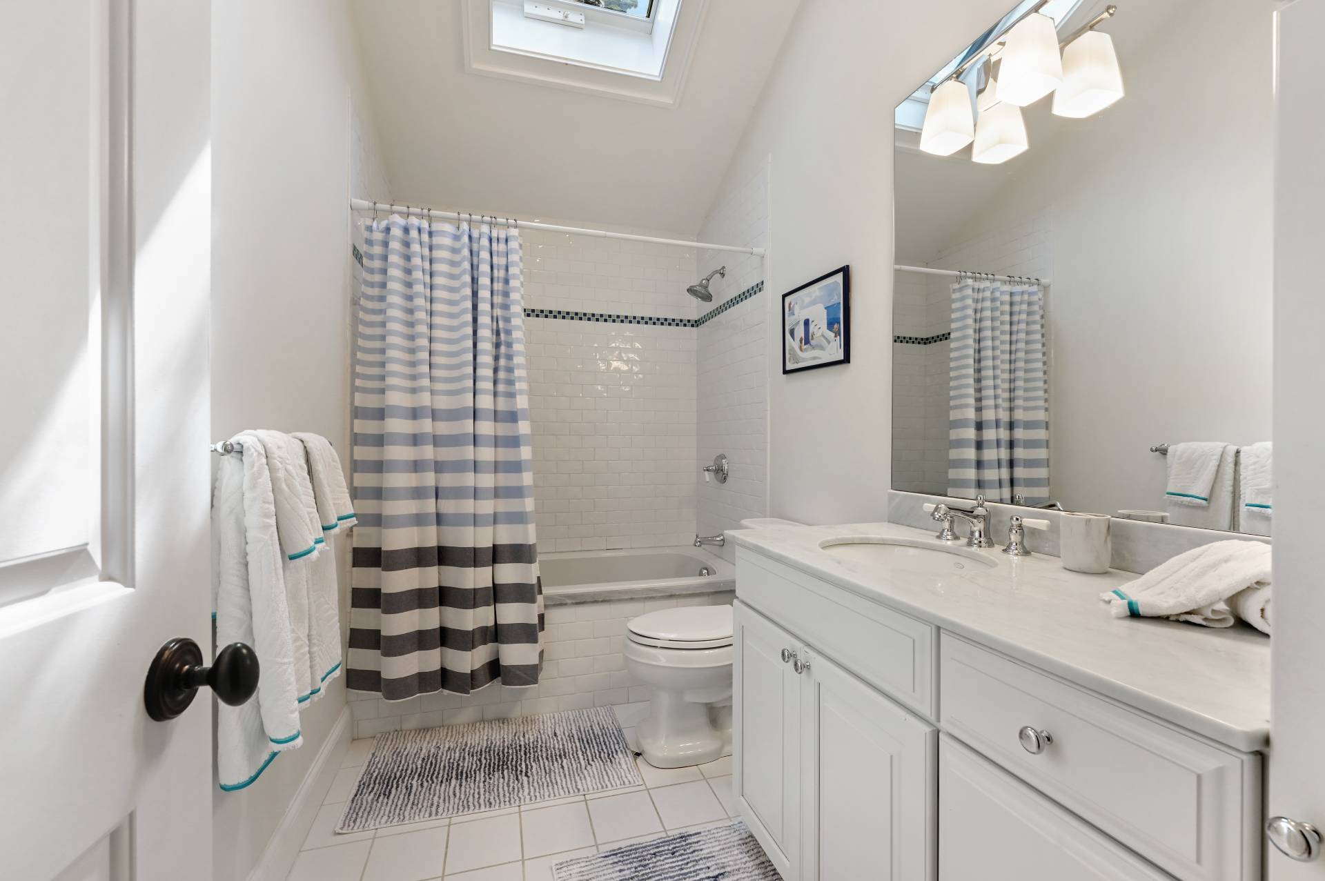 Undisclosed Address Water Mill, NY 11976 - Photo 25 of 28 a bathroom with a sink a toilet and shower