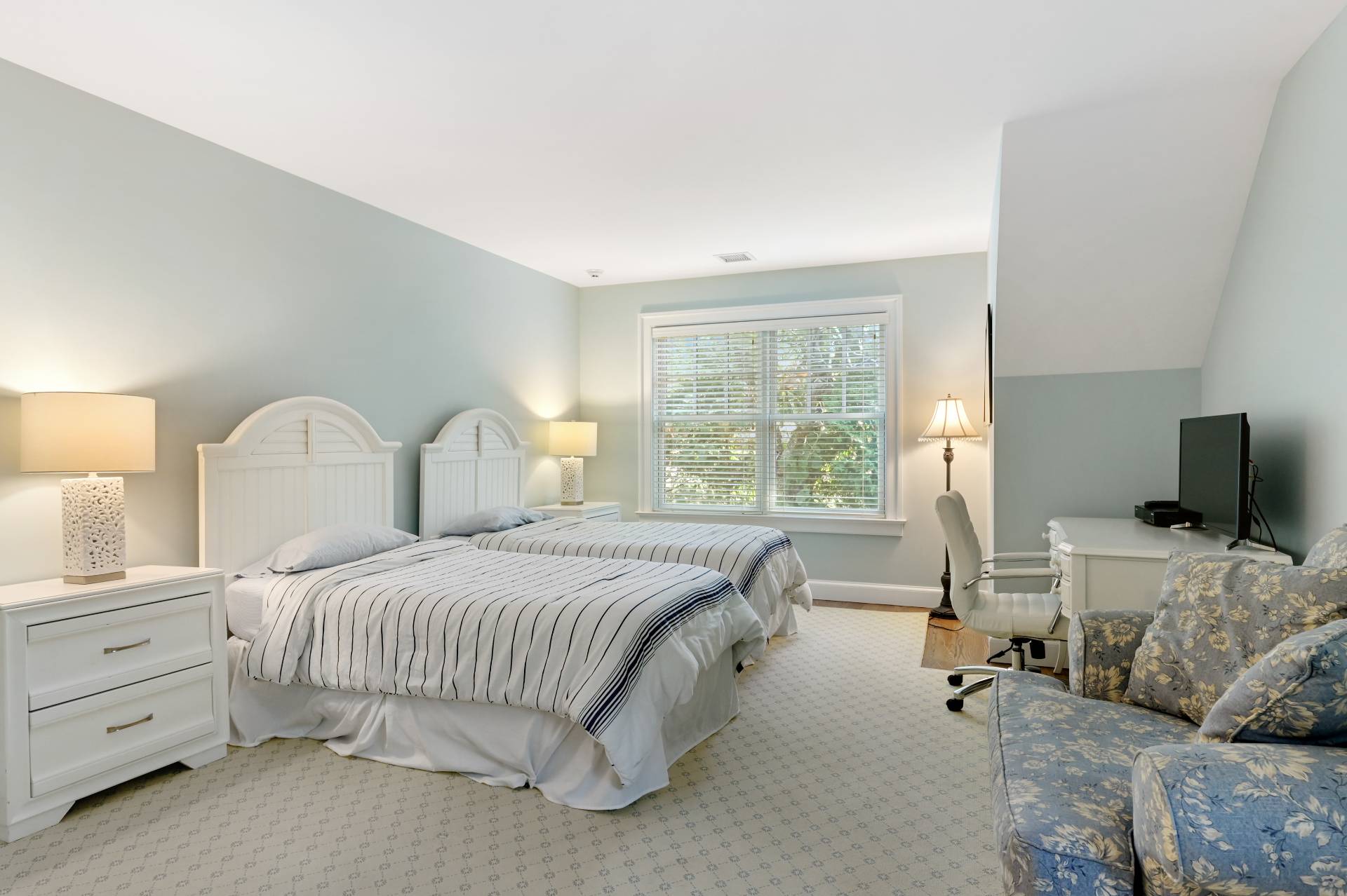 Undisclosed Address Water Mill, NY 11976 - Photo 26 of 28 a bedroom with a bed and a couch