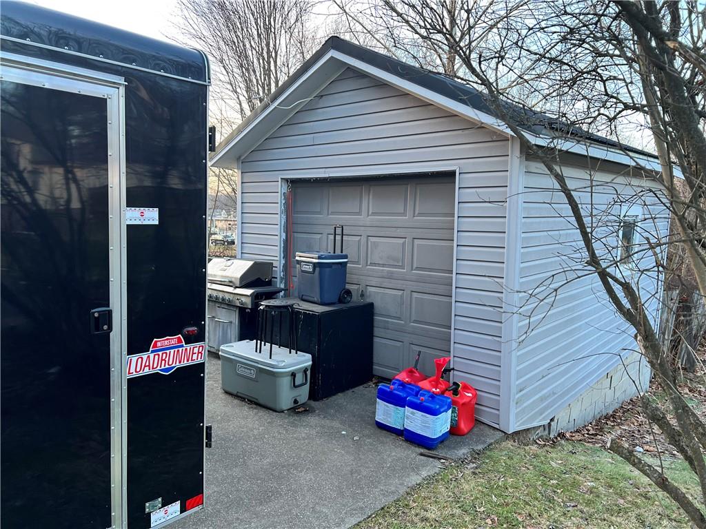 4 East Ridge Avenue Greenville, PA 16125 - Photo 4 of 24 a backyard of a house with outdoor seating