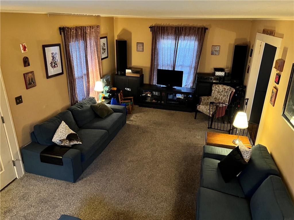 4 East Ridge Avenue Greenville, PA 16125 - Photo 5 of 24 a living room with furniture and a flat screen tv