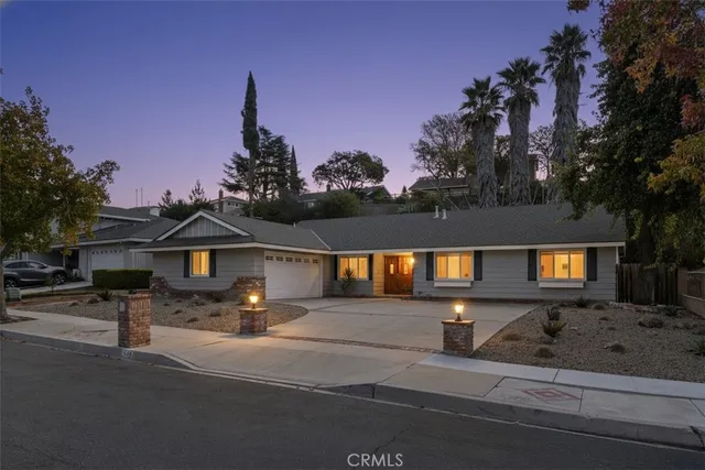 a front view of a house with a ocean view