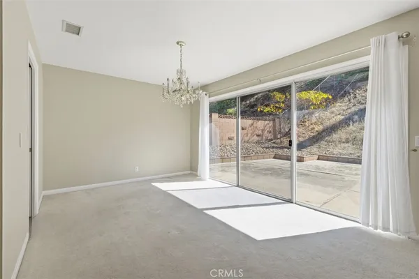 a view of an empty room with window
