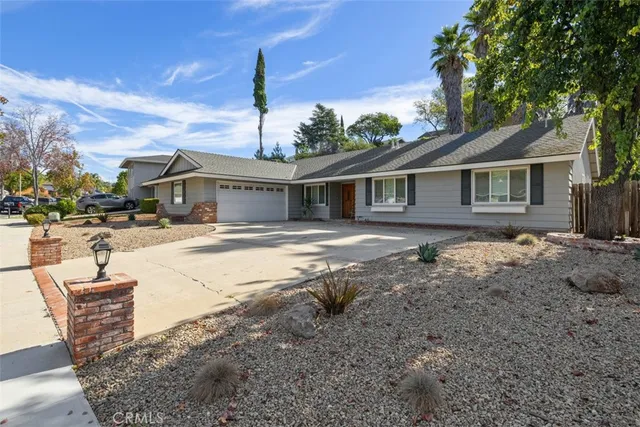 a house view with a outdoor space