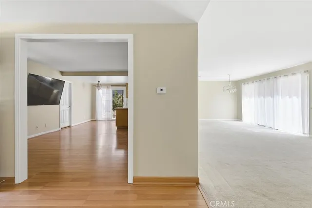 a view interior of a house with wooden floor and windows