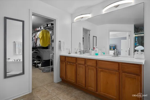 a bathroom with a sink and mirror