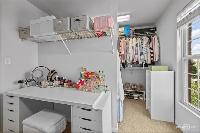 a utility room with cabinets dryer and washer