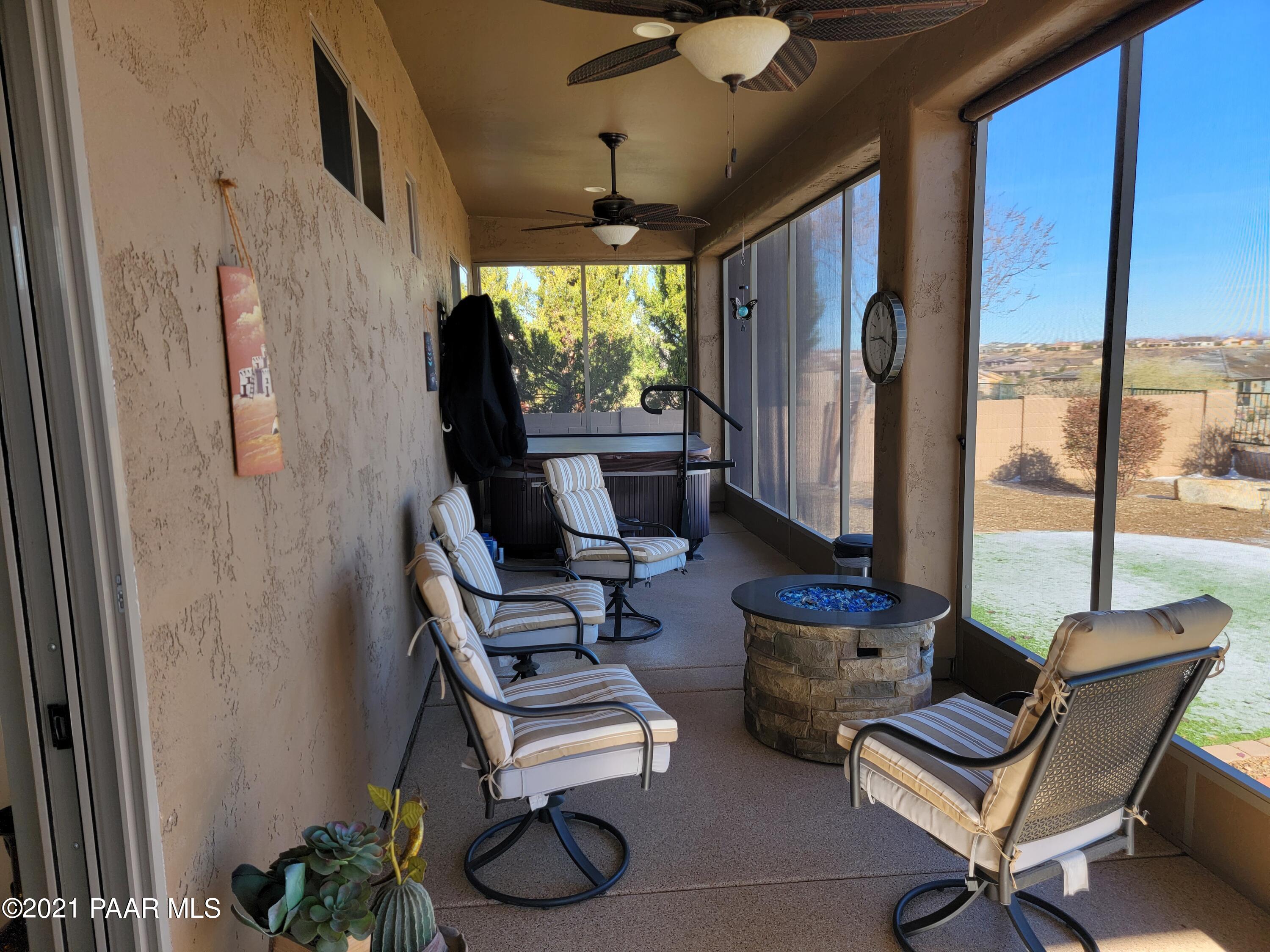 1181 Stack Rock Road Prescott Valley, AZ 86314 - Photo 13 of 25 a view of a livingroom with furniture and a window