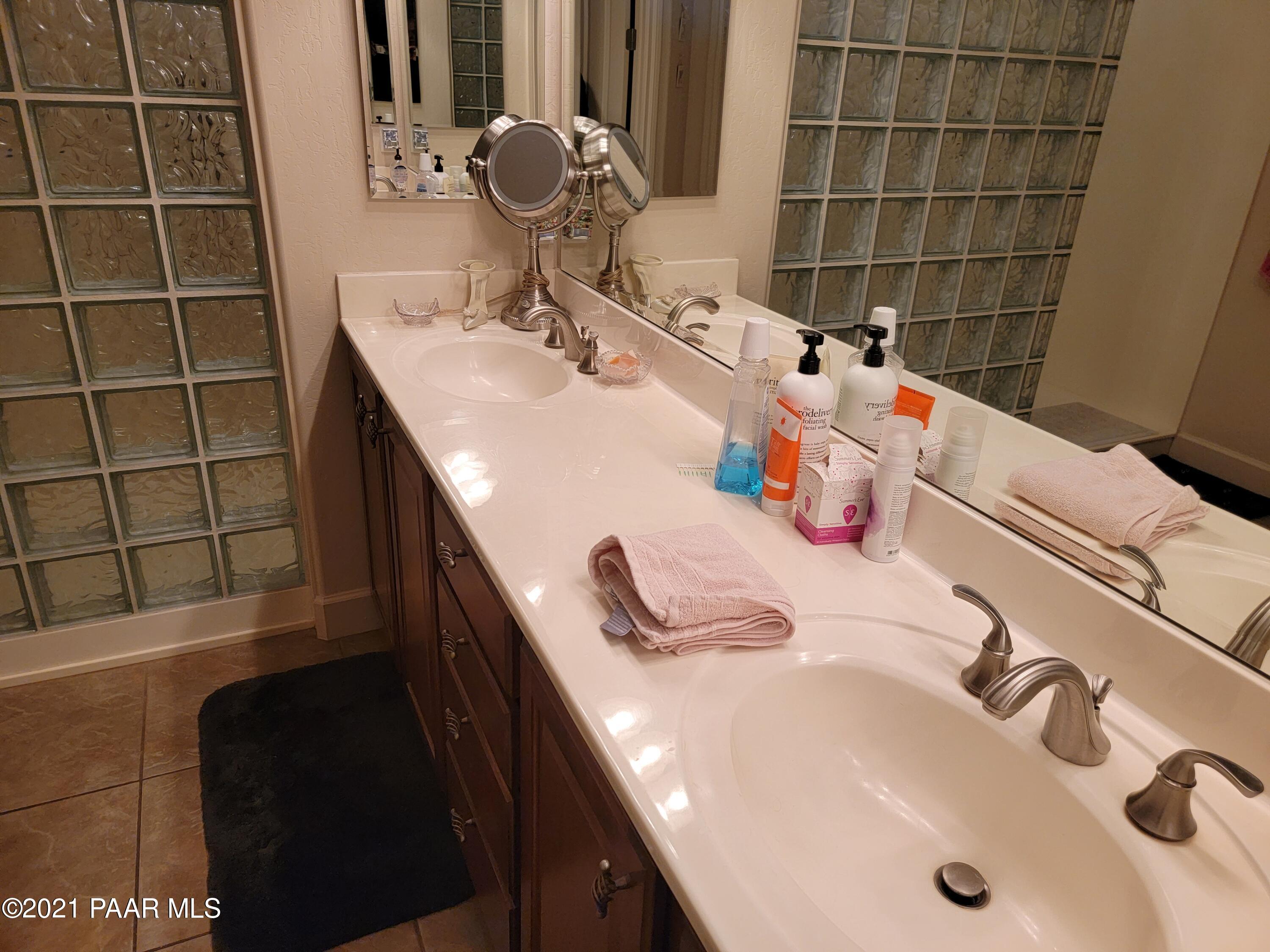 1181 Stack Rock Road Prescott Valley, AZ 86314 - Photo 16 of 25 a bathroom with a sink and a mirror