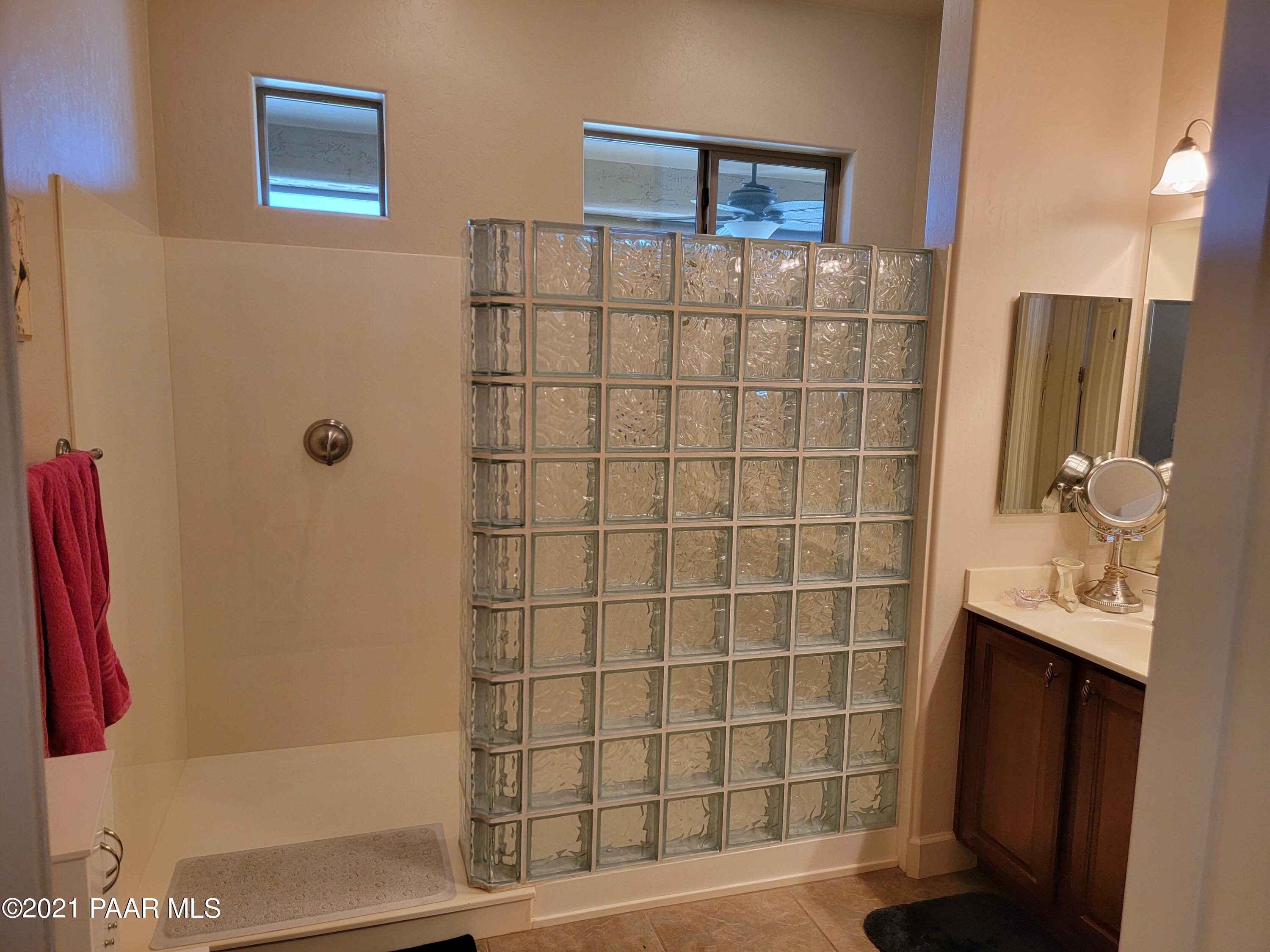 1181 Stack Rock Road Prescott Valley, AZ 86314 - Photo 17 of 25 a bathroom with a sink and a shower