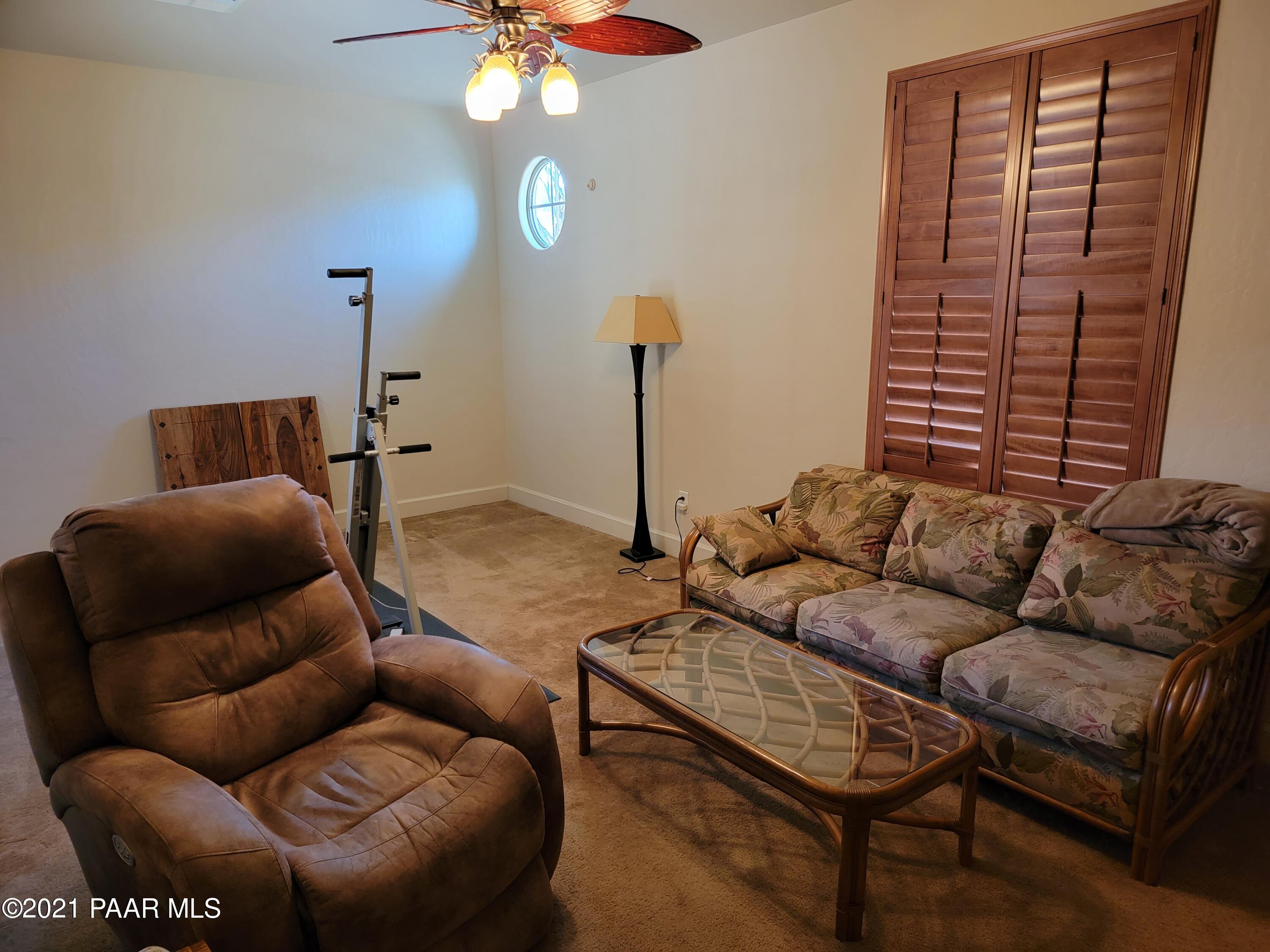 1181 Stack Rock Road Prescott Valley, AZ 86314 - Photo 20 of 25 a living room with furniture and a window