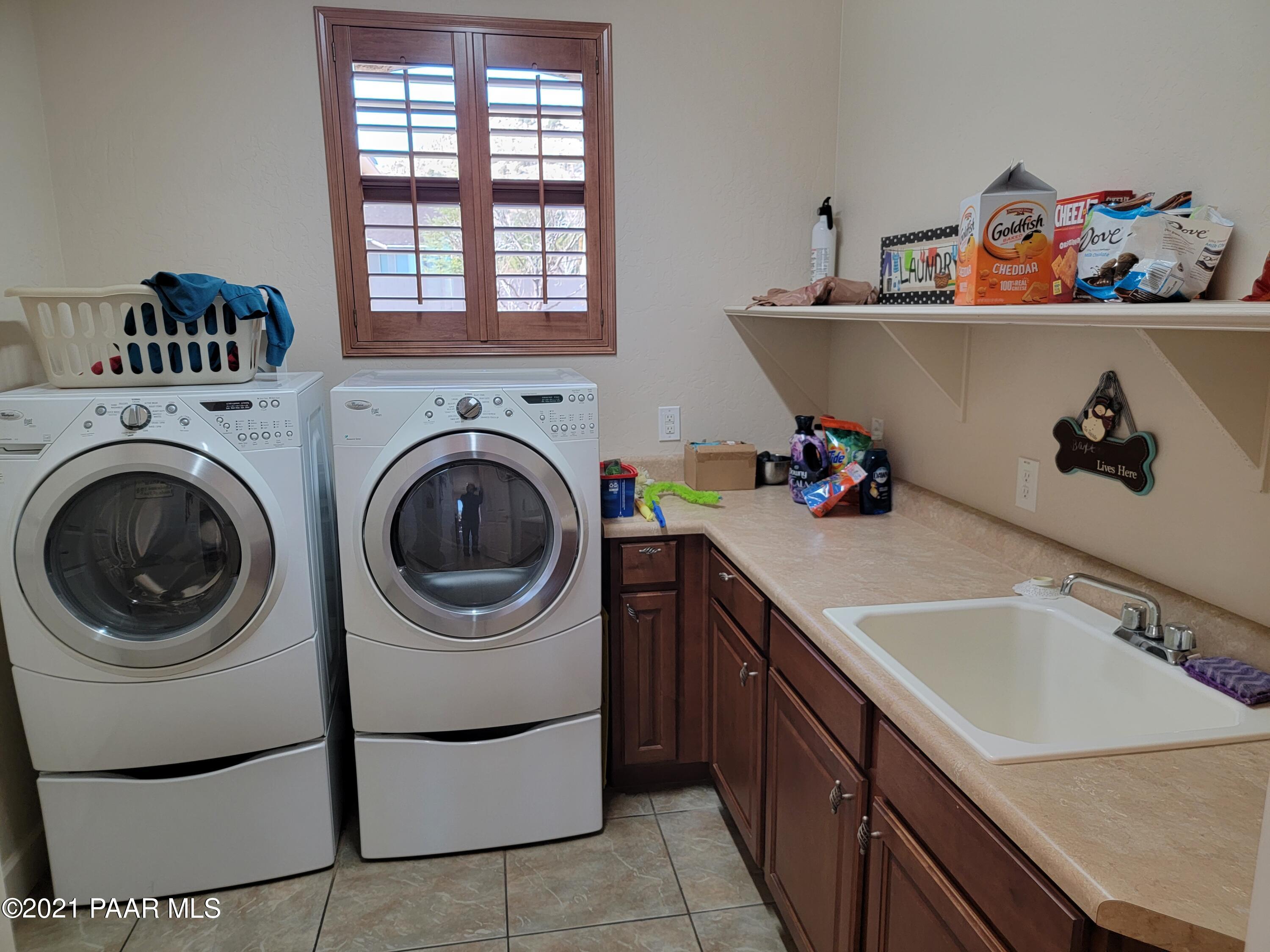 1181 Stack Rock Road Prescott Valley, AZ 86314 - Photo 23 of 25 a utility room with sink dryer and washer