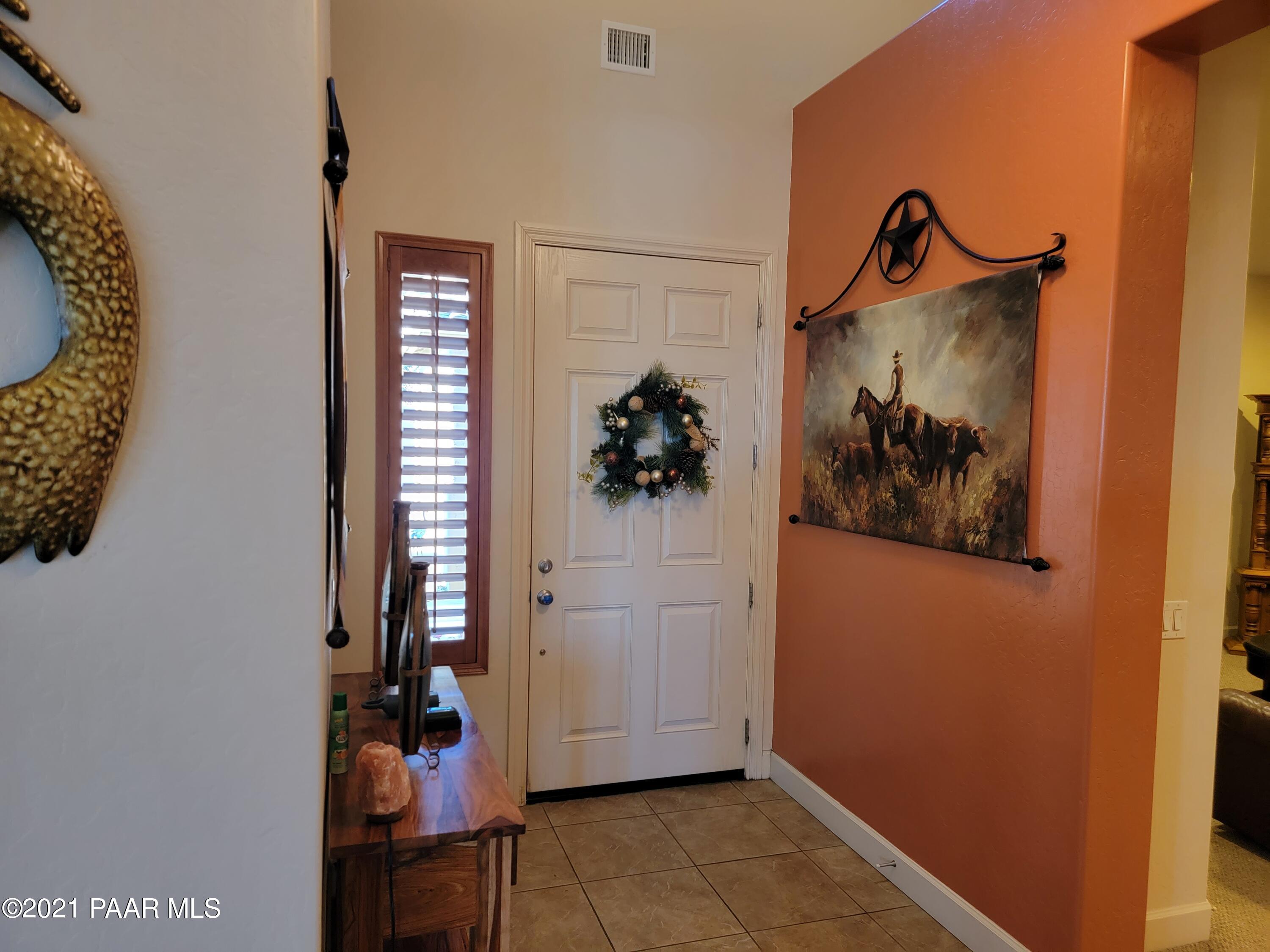 1181 Stack Rock Road Prescott Valley, AZ 86314 - Photo 5 of 25 a view of a hallway with a utility room and utility room