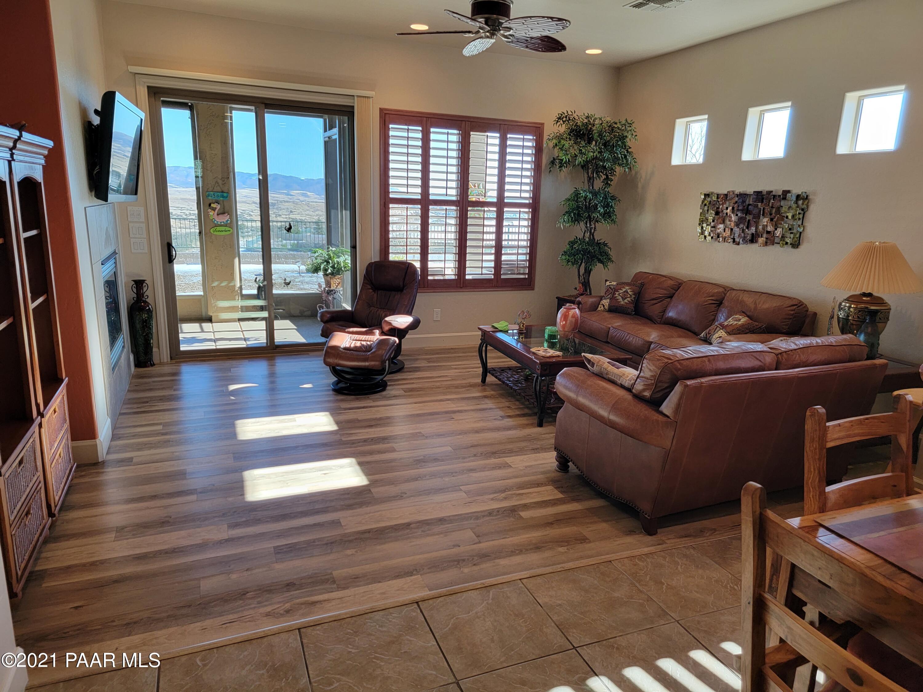 1181 Stack Rock Road Prescott Valley, AZ 86314 - Photo 10 of 25 a living room with furniture and a large window