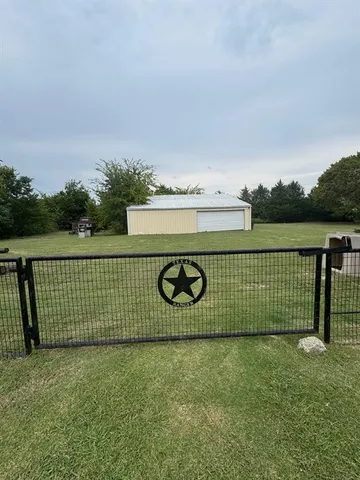 a sign board with a lake view