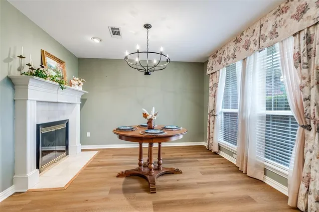 a view of a livingroom with furniture and a fireplace