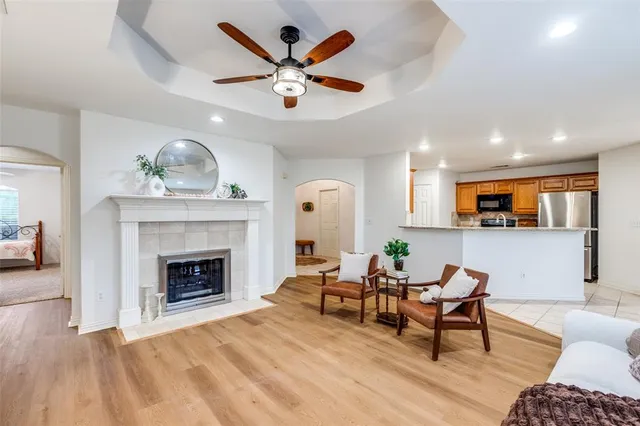 a living room with furniture and a fireplace