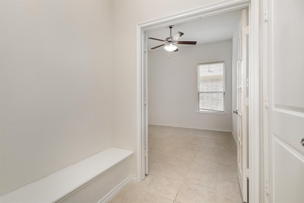 516 Maverick Street Anna, TX 75409 - Photo 22 of 28 a bathroom with a bathtub and shower