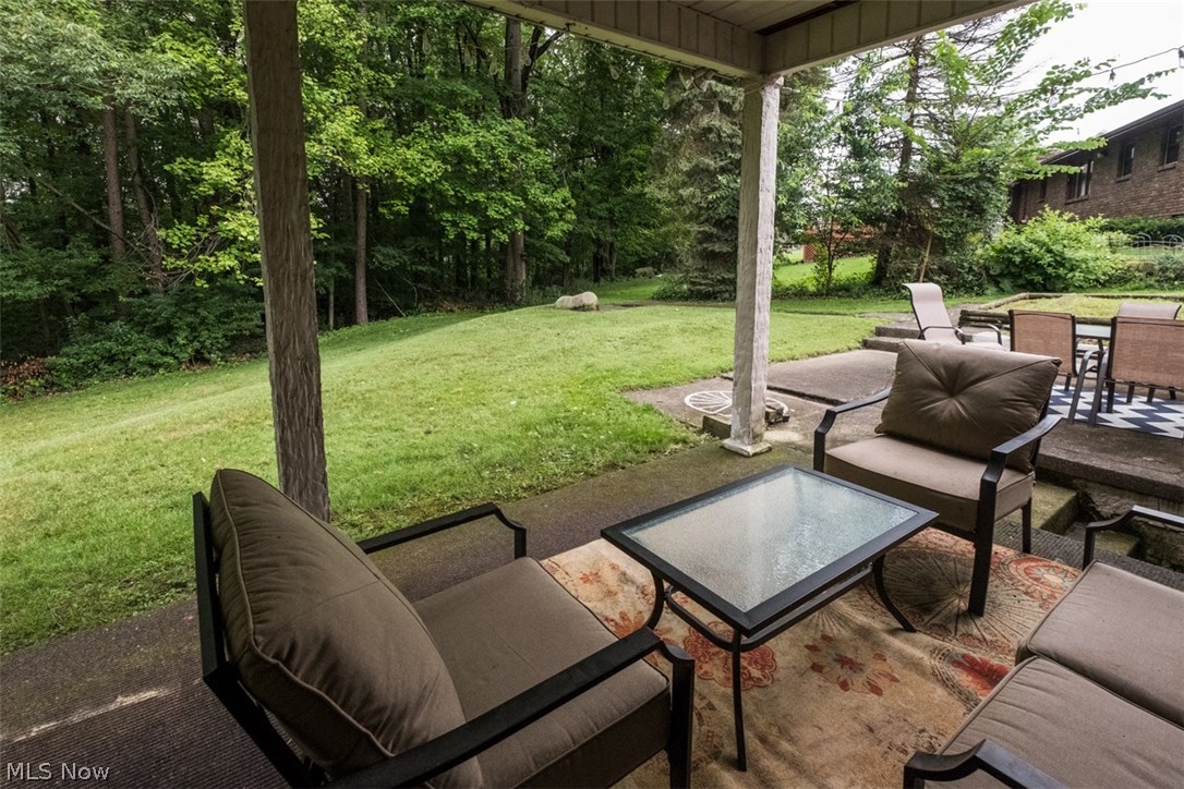 928 Upton Road Youngstown, OH 44509 - Photo 25 of 34 Covered back porch. Awesome place to relax in privacy