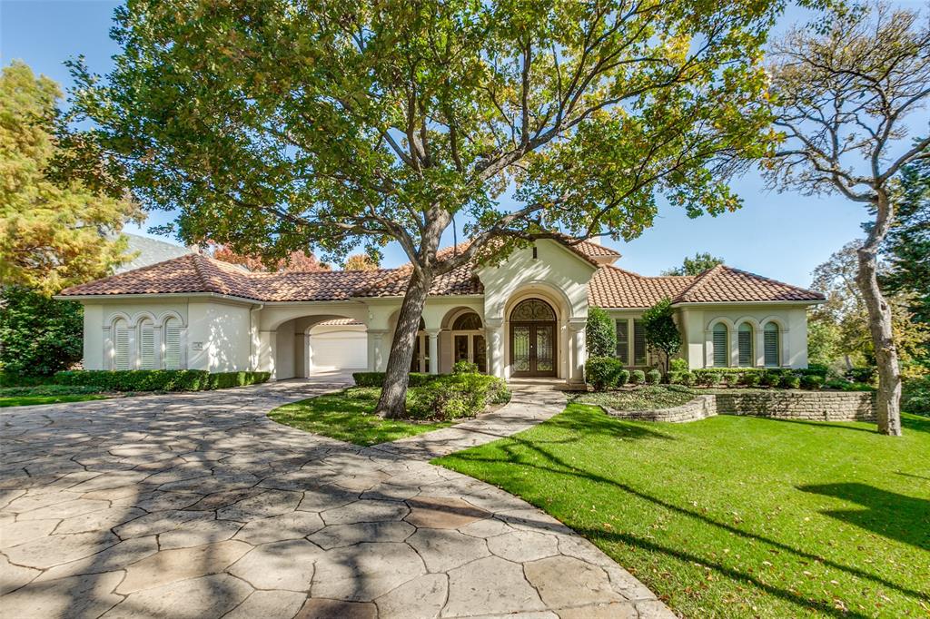 4 Green Park Drive Dallas, TX 75248 - Photo 1 of 1 a front view of a house with a yard