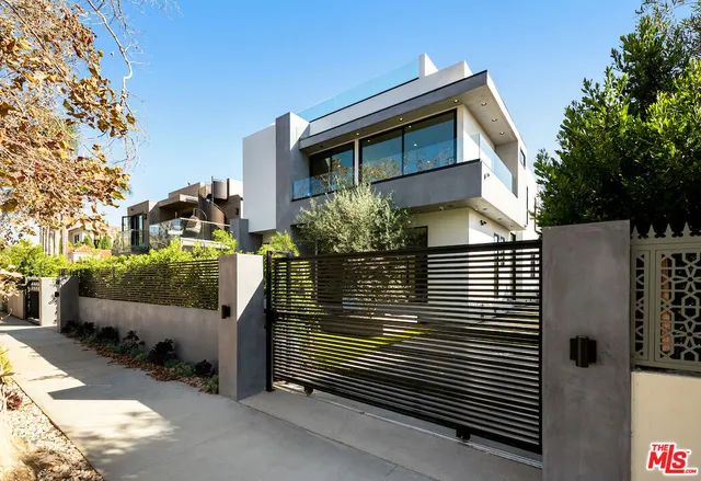 a front view of a house with street