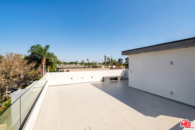 a view of a terrace with a bench