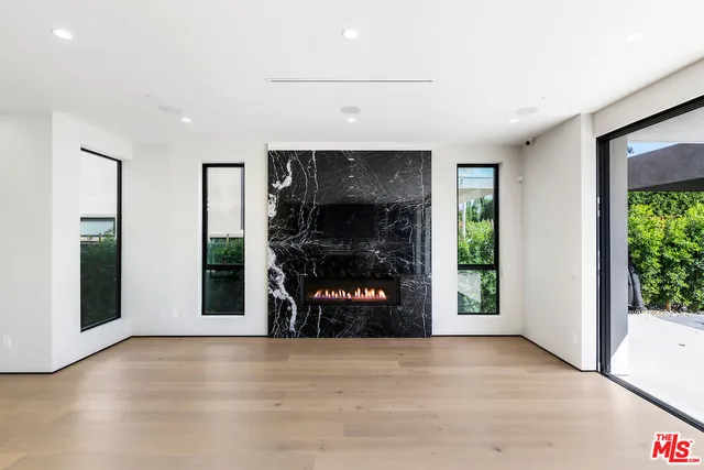 a view of an entryway of a house and window in the room