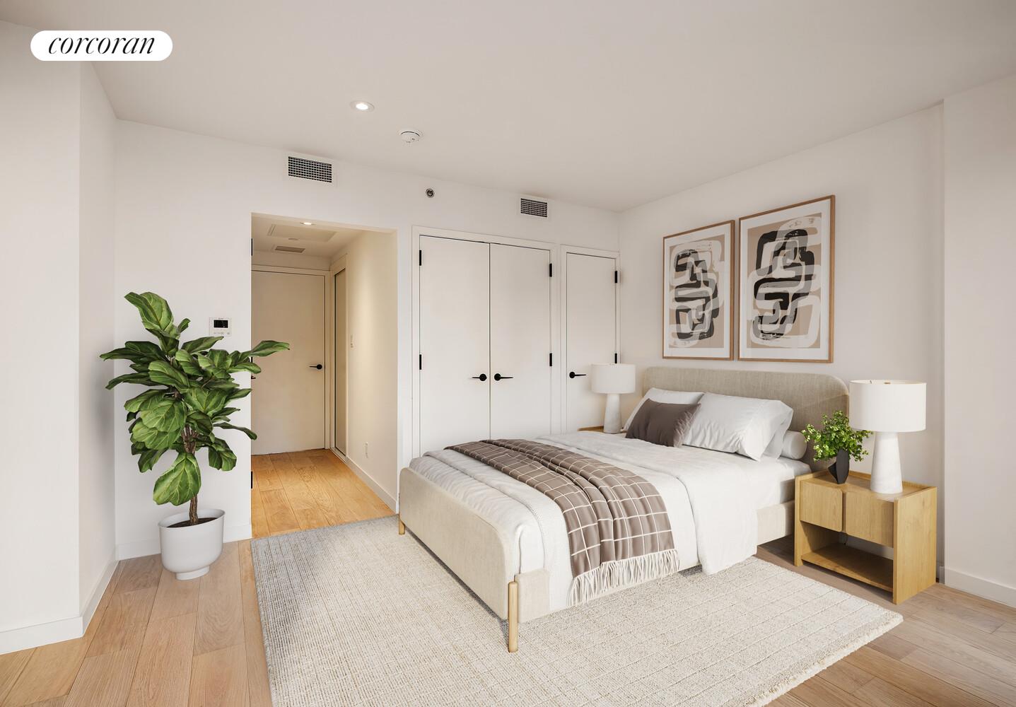 355 West 39th Street, Unit 9A Manhattan, NY 10018 - Photo 3 of 11 a bedroom with a bed and a potted plant