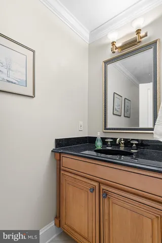 a living room with furniture a rug and a table