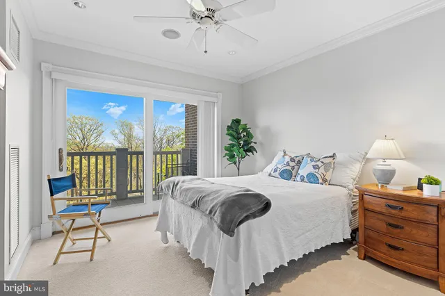 a bathroom with a granite countertop sink a mirror and a shower