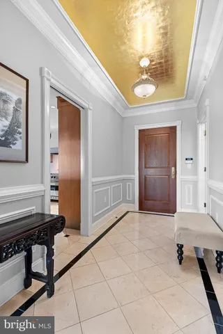 a view of a city with lush green forest