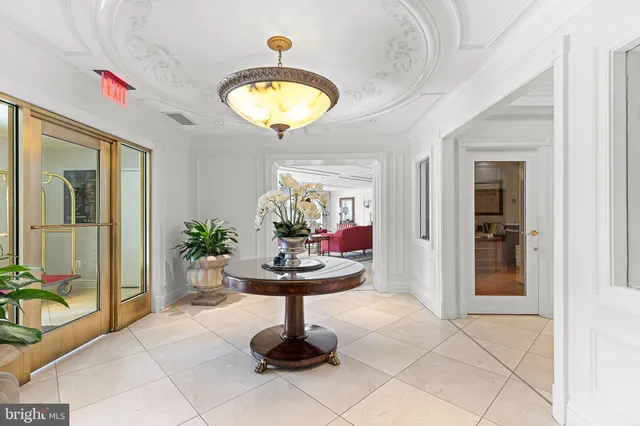 a view of an empty room and a bathroom