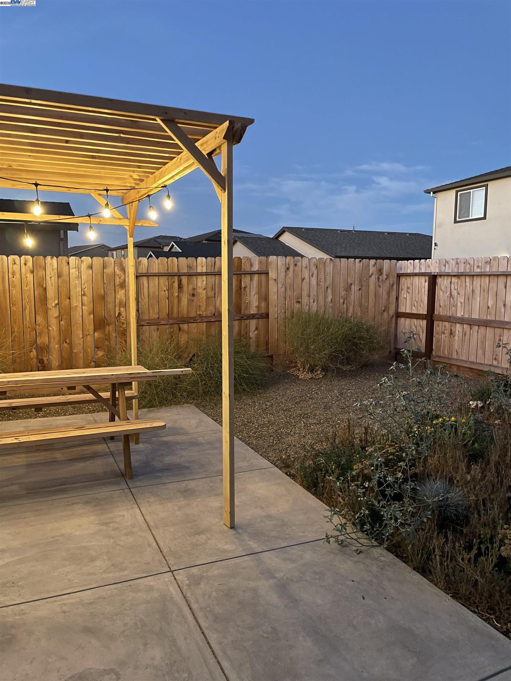4246 Freemark Avenue Merced, CA 95348 - Photo 13 of 27 a swimming pool with outdoor seating and yard