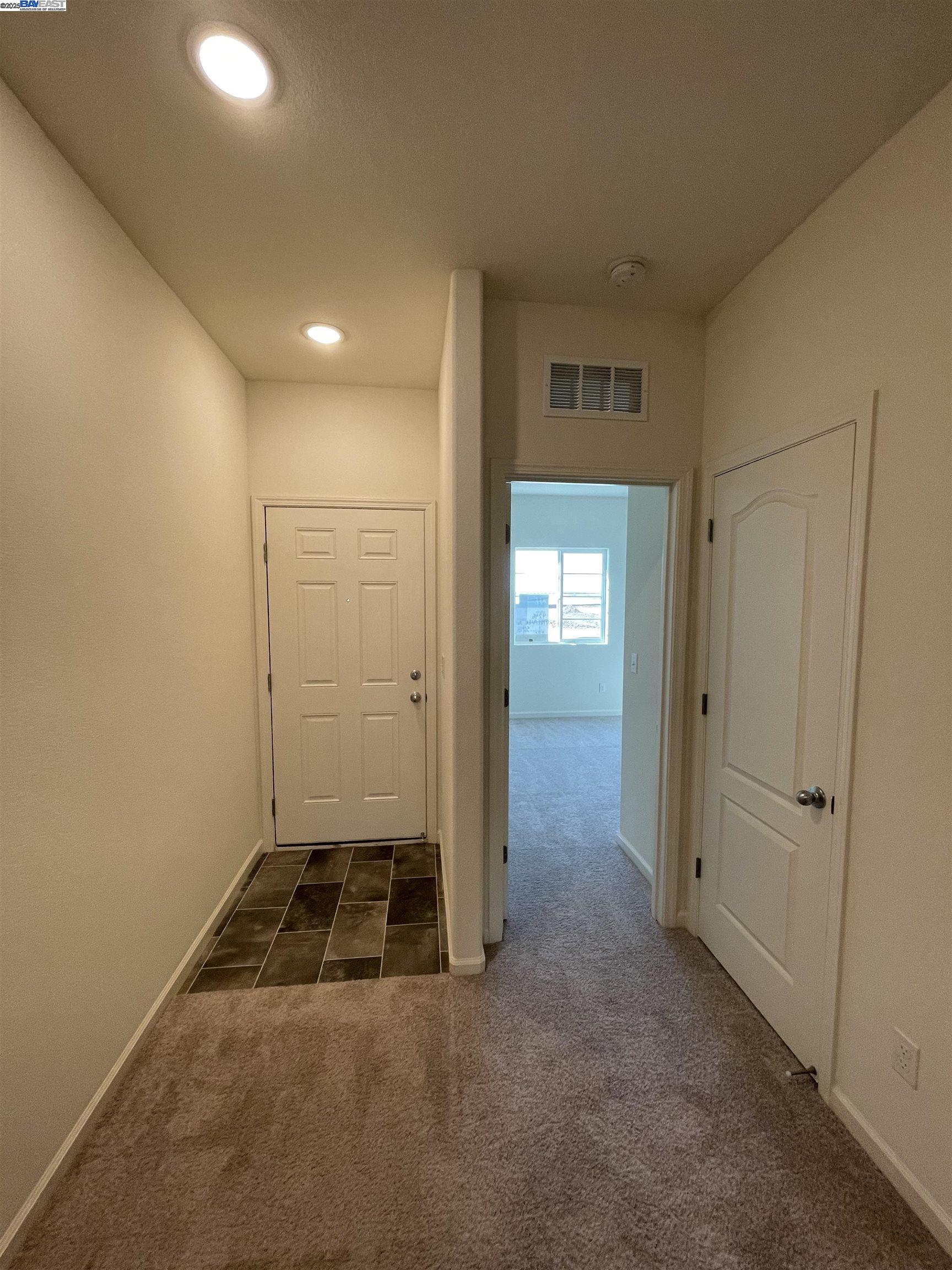 4246 Freemark Avenue Merced, CA 95348 - Photo 23 of 27 an empty room with windows