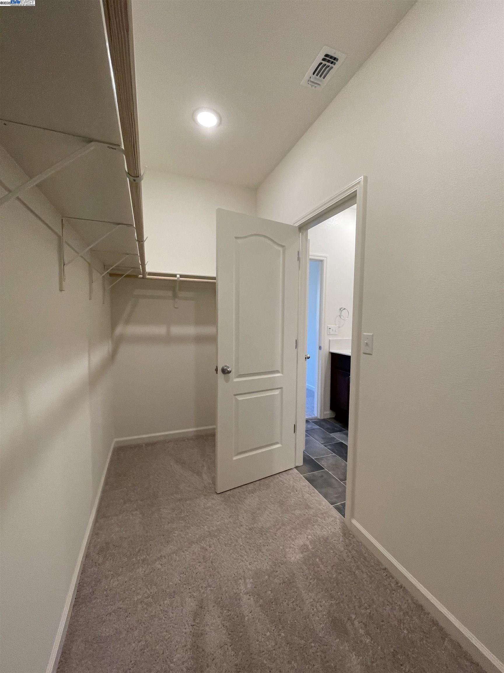 4246 Freemark Avenue Merced, CA 95348 - Photo 26 of 27 an empty room with closet and natural light